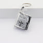 1:12 Mini Bible Cross Keychain