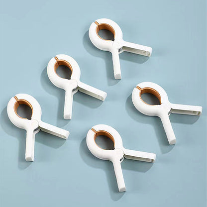 Pinces à couette robustes et coupe-vent